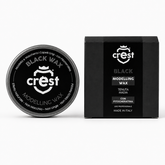 Crest Black Wax cera modellante tenuta media con fitocheratina, confezione chiusa con scatola su sfondo bianco.